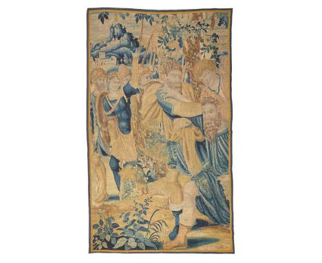 FLEMISH BIBLICAL TAPESTRY FRAGMENT EARLY 17TH CENTURY depicting a man being subjugated while soldiers look on, a hill town in