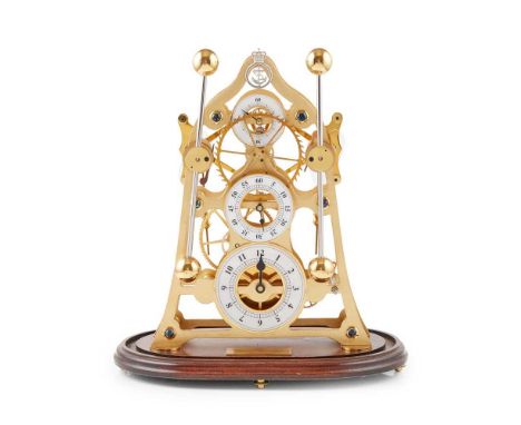 'THE DEVON SEA CLOCK' LIMITED EDITION BRASS SKELETON TIME PIECE  20TH CENTURY the three printed chapter ring dials held in a 