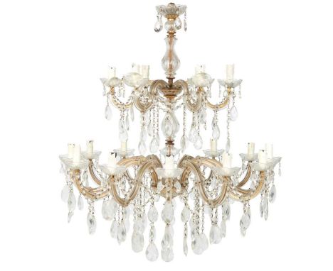 LARGE EIGHTEEN LIGHT GLASS CHANDELIER 20TH CENTURY with two tiers of scrolling candle arms issuing from a central baluster co