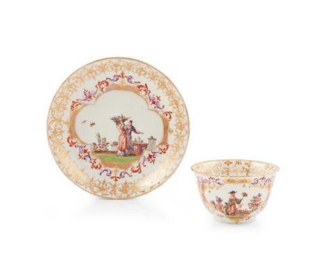MEISSEN TEABOWL AND MATCHED SAUCER CIRCA 1730 painted with chinoiserie scenes within gilt scrollwork cartouches filled with B