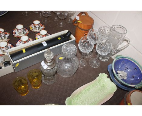 A cut glass and white metal mounted scent flask, a pair of amber vine etched glass tumblers, cutglass decanter, four hock gla