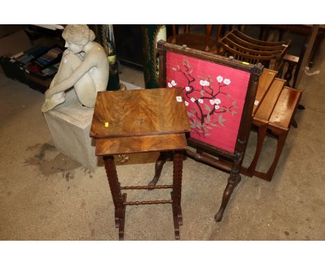 A Victorian mahogany fire screen and a nest of two walnut occasional tables raised on bobbin turned supports
