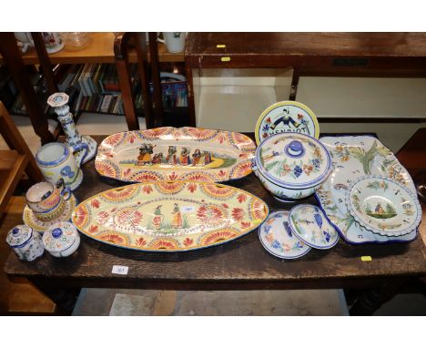 A collection of various Quimper pottery