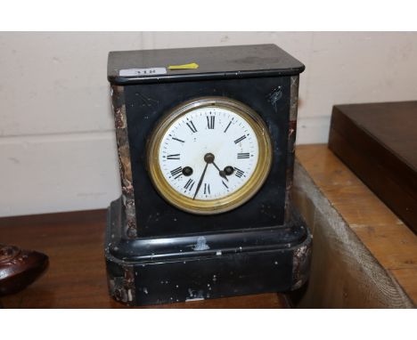 A marble cased, eight day mantel clock