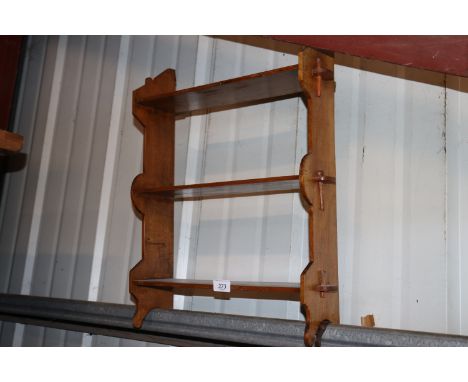 An oak shelf of pegged construction