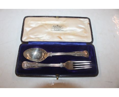 A cased silver fork and spoon, approx. total weight 1.9oz (72gms)