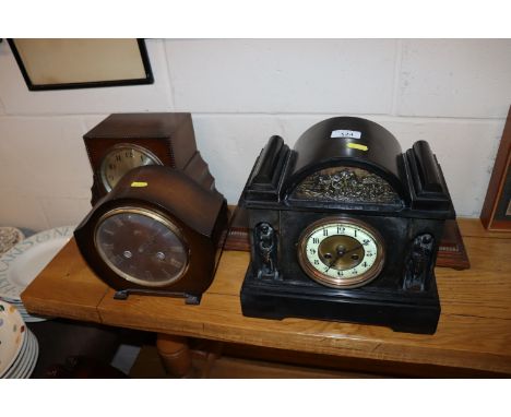 A Victorian marble cased mantel clock with eight day movement and three oak cased 1930s mantel clocks