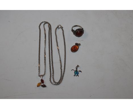 An amber and Sterling silver ring, pendant and chain, and an opal turtle pendant 