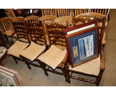 A set of four ladder back and rush seated dining chairs 