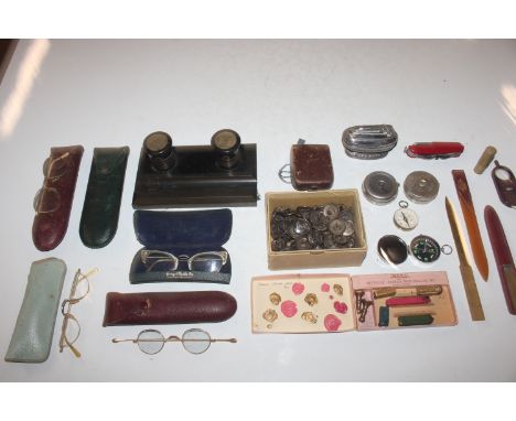 A box containing desk stand fitted with two inkwells; various spectacles and spectacle cases; a Ronson table lighter; pen kni