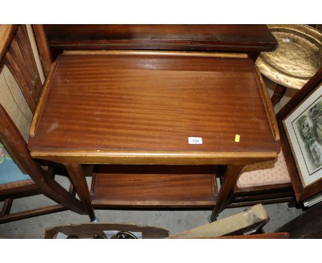A vintage two tier tea trolley