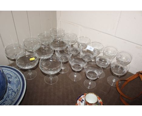 A collection of vintage glass Champagne saucers