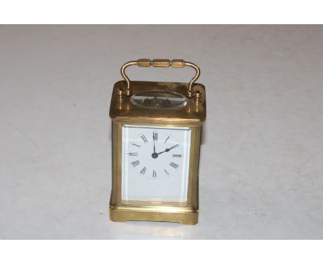 A brass cased carriage clock 