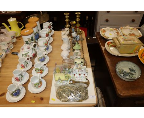 A quantity of horse brasses, pastel burner, David Winter cottages, Parian ware jug, brass candle sticks, brass vase, toasting