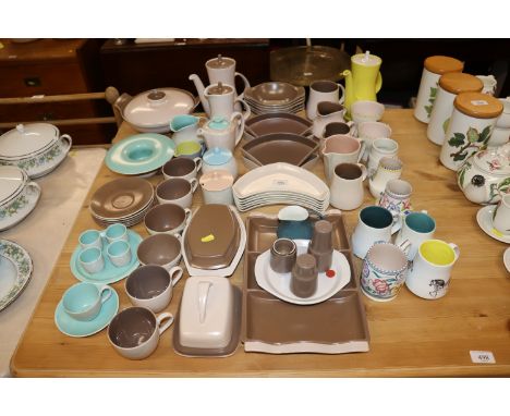 A large collection of various Poole two tone pottery, Poole vases etc.
