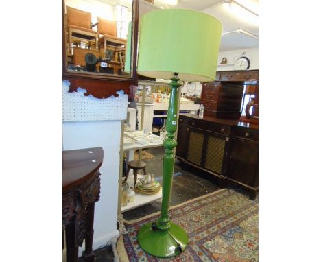 A Green contemporary lamp with shade