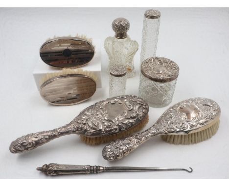 Silver backed dressing table brushes and four silver top jars. UK P&amp;P Group 2 (£20+VAT for the first lot and £4+VAT for s