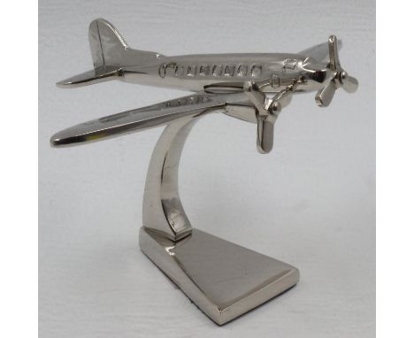 Chrome Dakota aeroplane on stand, H: 14 cm. UK P&amp;P Group 2 (£20+VAT for the first lot and £4+VAT for subsequent lots)