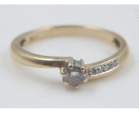 18ct gold diamond set solitaire ring, asymmetric, with diamond set shoulder, size N/O, 2.5.g. UK P&amp;P Group 0 (£6+VAT for 