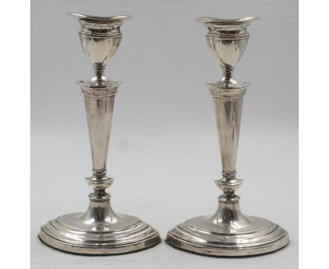 Pair of hallmarked silver candlesticks, weighted, Sheffield assay, H: 18 cm.UK P&amp;P Group 1 (£16+VAT for the first lot and
