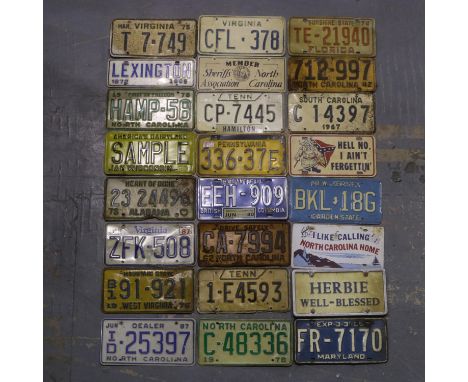 Collection of 25 vintage tin American car number plates from various American states from 1960s, 70s and 80s. UK P&amp;P Grou