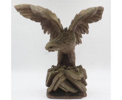 Carved wooden model of eagle on carved base. H: 23cm. UK P&amp;P Group 3 (£30+VAT for the first lot and £8+VAT for subsequent
