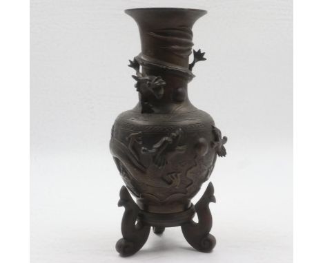 Oriental bronze vase, with four toed Dragon decoration on tripod stand, H: 25 cm. UK P&amp;P Group 2 (£20+VAT for the first l