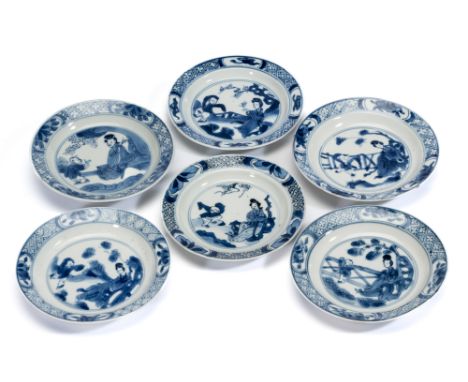 SIX SMALL MATCHED CHINESE BLUE AND WHITE DISHES. QING DYNASTY, KANGXI PERIOD (1662-1722) each painted to the interior with a 