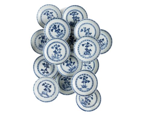 SIXTEEN CHINESE BLUE AND WHITE NANKING CARGO SAUCERS, QIANLONG, CIRCA 1750 each painted to the interior with a diaper medalli