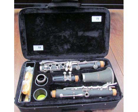 A Windsor ebony and white metal mounted clarinet, cased