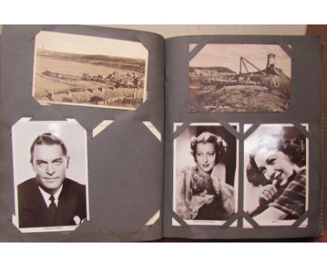 A "My Film Favourites" postcard album, containing scenic and portrait cards etc