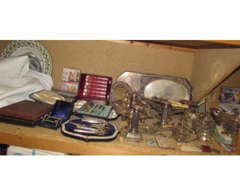 Assorted electroplated wares including cased grape scissors, cased knives and forks, pedestal dishes, candlesticks, sugar bas