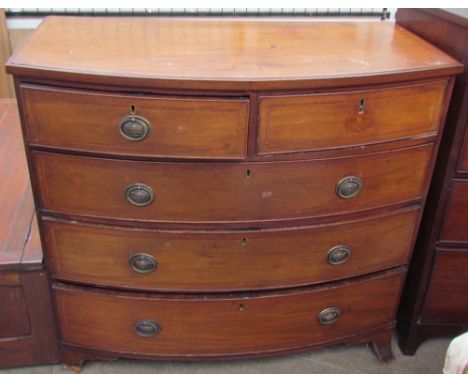 A 19th century mahogany bow front chest, the crossbanded top above two short and three long graduated drawers on splayed brac