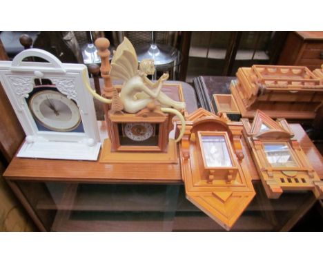 Bryan Gibbons, Cardiff - An Art Nouveau inspired mantle clock, together with another mantle clock and two wall plaques