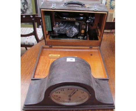 An oak cased Napoleon hat mantle clock, together with a faux crocodile cased Singer sewing machine
