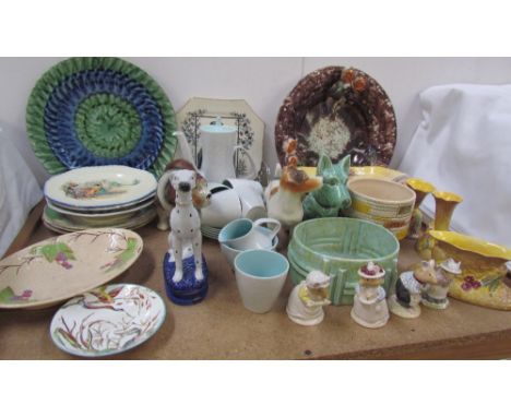 A Poole pottery part tea set together with pottery dogs, James Kent vases, pottery plates etc