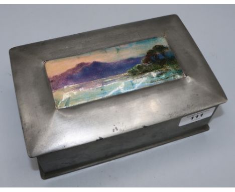 Tudric Pewter and enamel box with hinged lid, likely for Liberty and Co. the inset enamel plaque depicts a lake and landscape