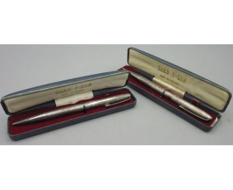 Two 20thC silver 'Yard-O-Led' mechanical pencils both cased and decorated in engine turned pattern by E Baker &amp; Son, Birm