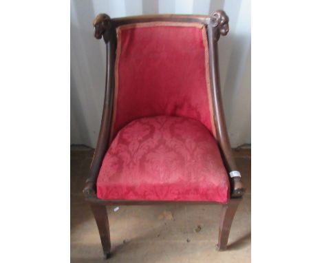 Victorian Regency style side chair, curved back with ramshead carved cresting, sprung drop in seat on sabre legs with ceramic