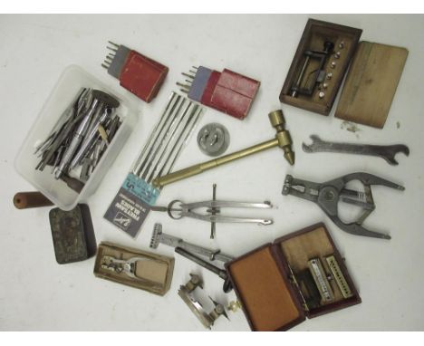 Watchmakers repair tools including pliers, tweezers, needle files, movement holder etc.