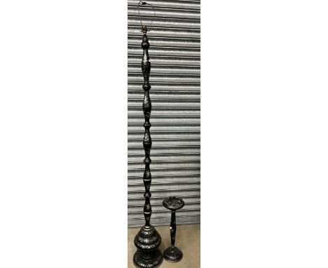 Indian black painted and engraved metal standard lamp, and a similar free standing ashtray, H171cm and H49cm (2)