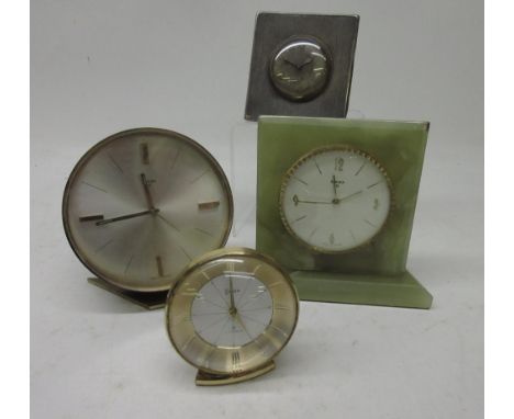 Swiza 8 day onyx alarm clock, signed white dial with Arabic and baton indices, H13cm; two other Swiza alarm clocks H13cm and 