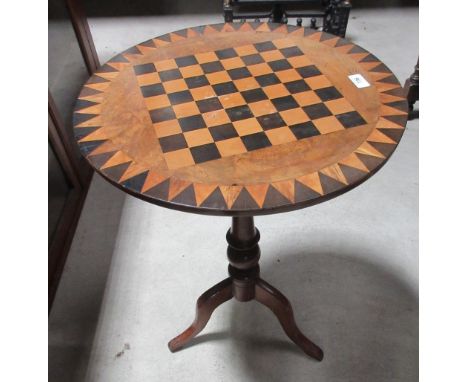 Victorian circular top games table with marquetry inset chess board panel within outer dragon tooth border on turned column, 