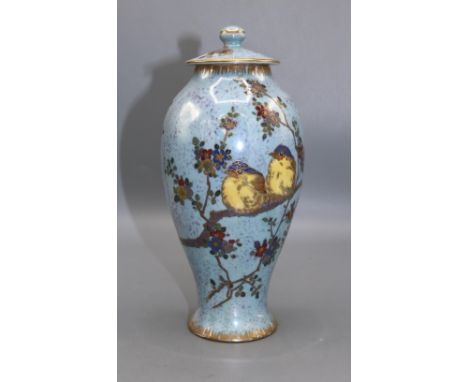 Carlton Armand Lustre temple jar and cover, decorated with two birds perched upon branches with coloured blossoms, pale blue 
