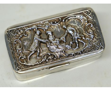 Late Victorian silver snuff box, repousse cover depicting a skating scene with two male attendants pushing a female on a carr
