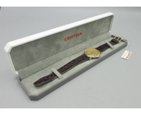 Certina Kurth Freres gold plated wristwatch on original leather strap, signed gold tone engine turned dial with Roman chapter