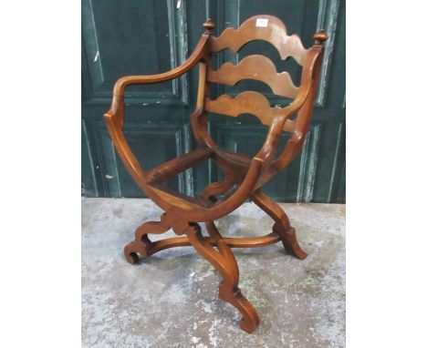 Eastern X frame ladder back chair, with turned finials and downcurved arms, lacks seat