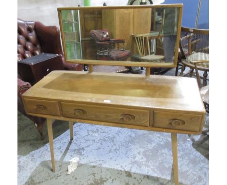 Ercol light elm dressing table, adjustable mirror above three drawers, two with glass slides, on splayed angular legs, W114cm