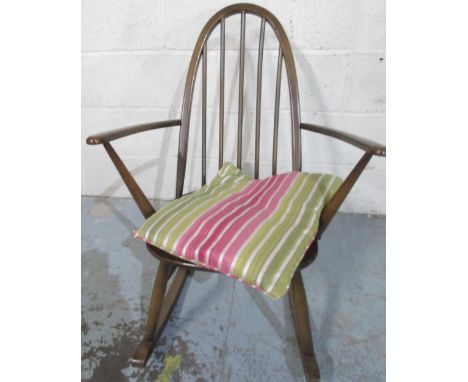 Dark Ercol hoop and stick back rocking chair, impressed marks