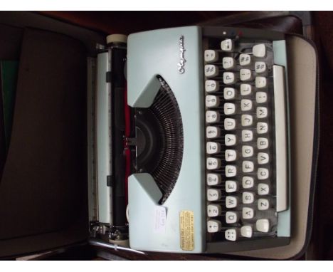 Vintage Olympia typewriter in a case